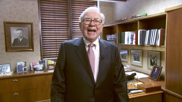 A smiling Warren Buffett inside his Omaha, Neb., office 