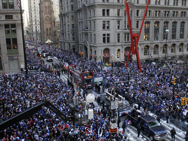 The New York Giants  make their way up Broadway  