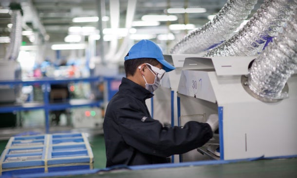 A worker at an Apple supplier facility in Chengdu, China. 