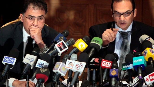 Egyptian investigative judges Ashraf el-Ashmawi, left, and Sameh Abu Zeid, who are investigating the case of foreign funding of non-governmental organizations, speak during a press conference at the Ministry of Justice in Cairo Feb. 8, 2012. 