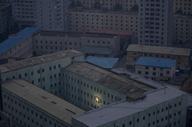North Korea's founder, Kim Il-sung, decorating a building in the capital Pyongyang, North Korea 