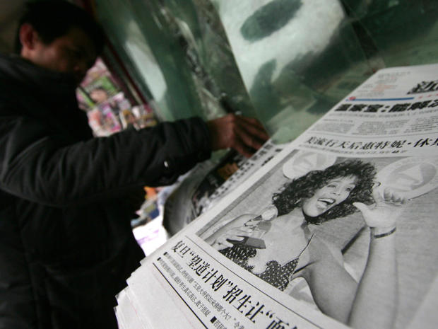 Newspaper headine in Shanghai China:"American Queen of Pop Whitney Houston died" 