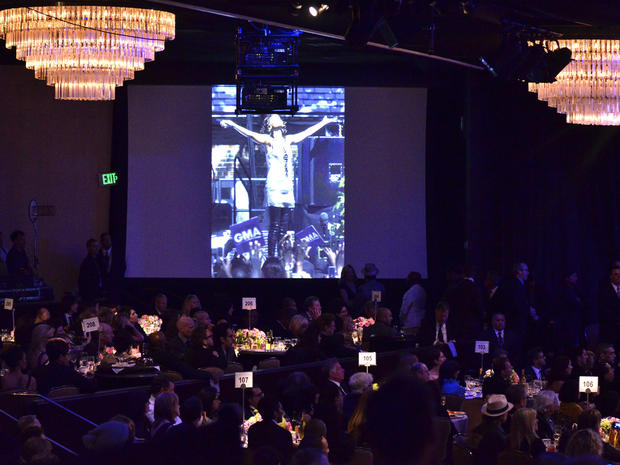 Guests observe a minute of silence in memory of Whitney Huston during the Clive Davis Pre-Grammy Gala 