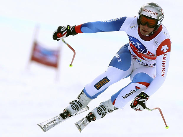 Beat Feuz competes on his way to win an alpine ski 