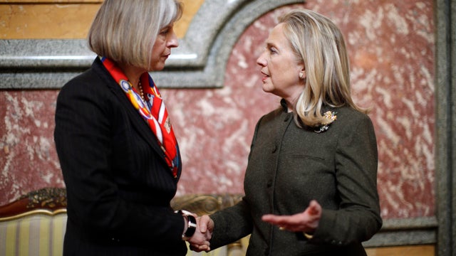 Hillary Clinton meets with British Home Secretary Theresa May at the London Conference on Somalia 