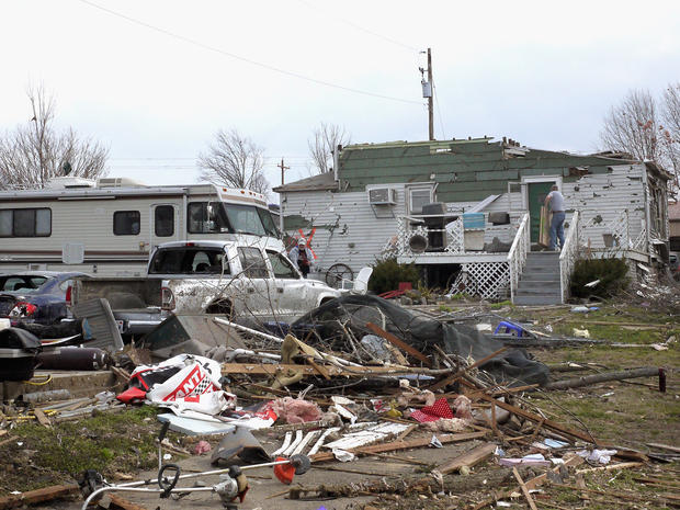 Residents continue to clean up following a tornado  