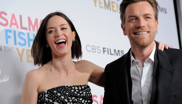 Emily Blunt, left, and Ewan McGregor, cast members in "Salmon Fishing in the Yemen," share a laugh at the premiere in Los Angeles on  March 5, 2012. 