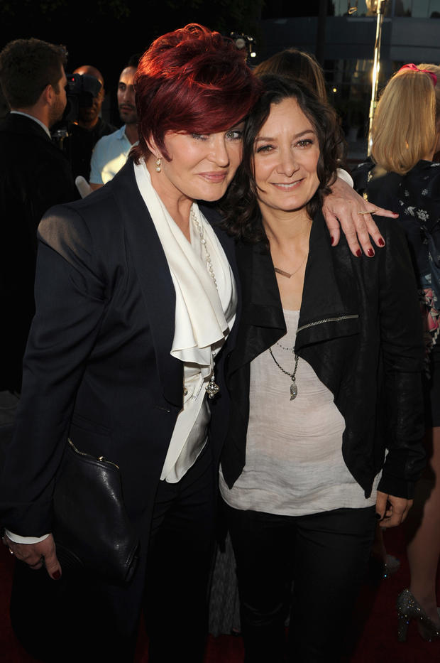 kevin-winter-sharon-osbourne-and-actress-sara-gilbert-arrive-at-the-screening-of-god-bless-ozzy-osbourne.jpg 