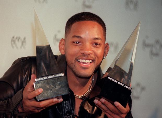 gerard-burkhart-actor-and-recording-star-will-smith-holds-up-two-of-the-three-awards.jpg 