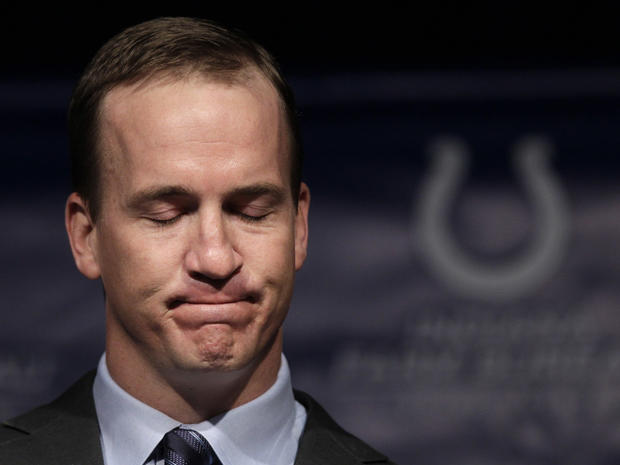 Peyton Manning collects his thoughts as speaks 
