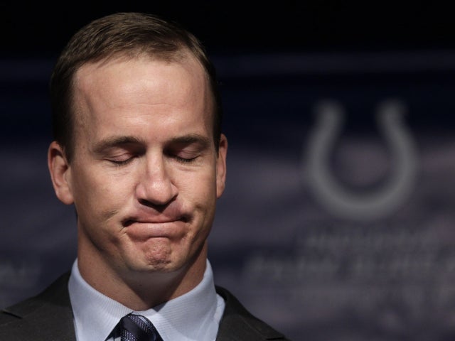 Peyton Manning collects his thoughts as speaks 