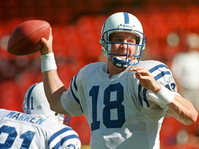 Peyton Manning throws a touchdown pass 