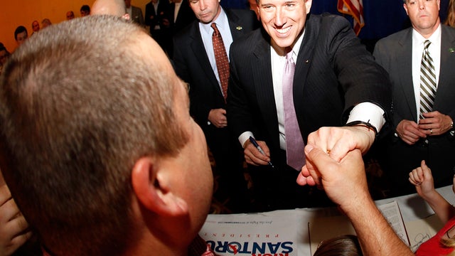 Former Sen. Rick Santorum greats supporters after winning the Alabama and Mississippi primaries March 13, 2012, in Lafayette, La. 