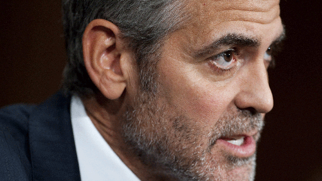 001-clooney-on-hill.gif 