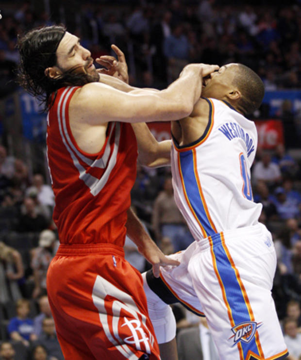 Luis Scola and Russell Westbrook collide 