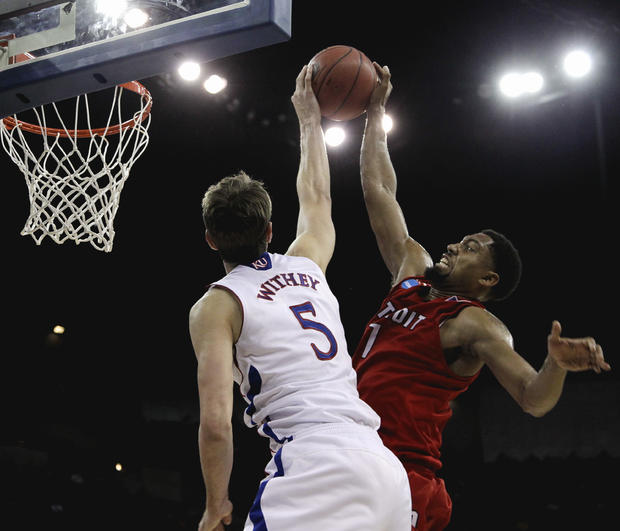 Chase Simon is blocked by Kansas' Jeff Withey  