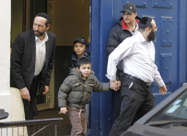 schoolchildren leave a  Jewish school in Paris 