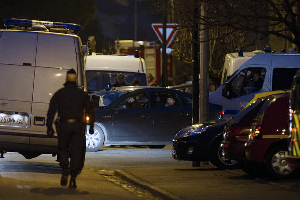 Members of the RAID special police forces unit are seen in a car as they leave the apartment block where Mohamed Merah, the man suspected of a series of deadly shootings, was holed up March 21, 2012, in Toulouse, France. 
