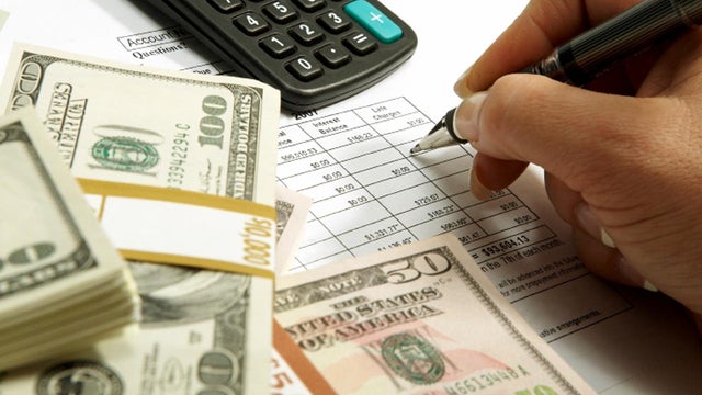 Checking Loan Papers 