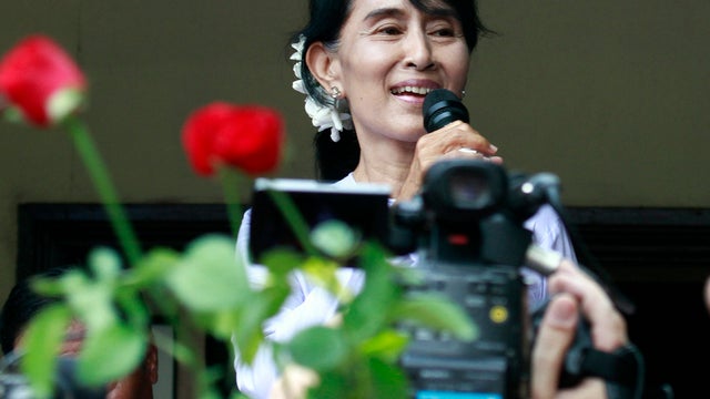 Aug San Suu Kyi speaking on Monday in Rangoon 