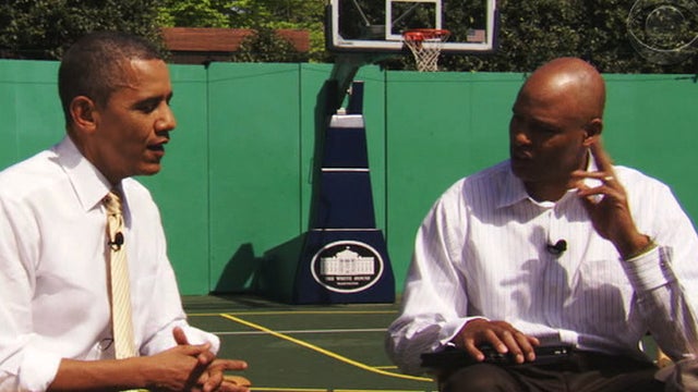 President Obama and CBS Sports commentator Clark Kellogg in interview aired during halftime of the NCAA basketball championship game won by Kentucky over Kansas on April 2, 2012 