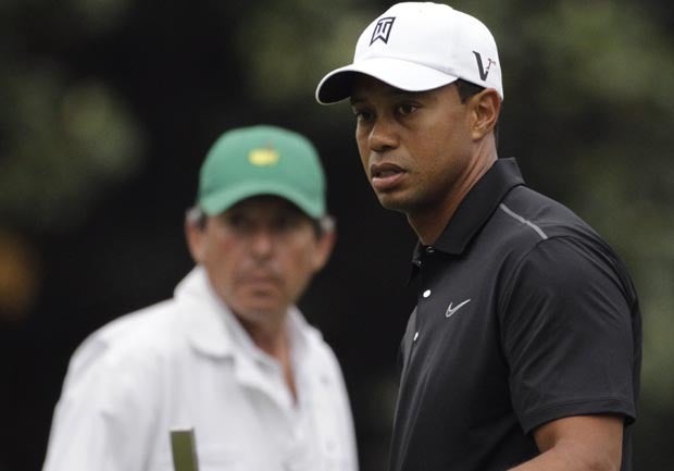 Tiger Woods lines up his putt 