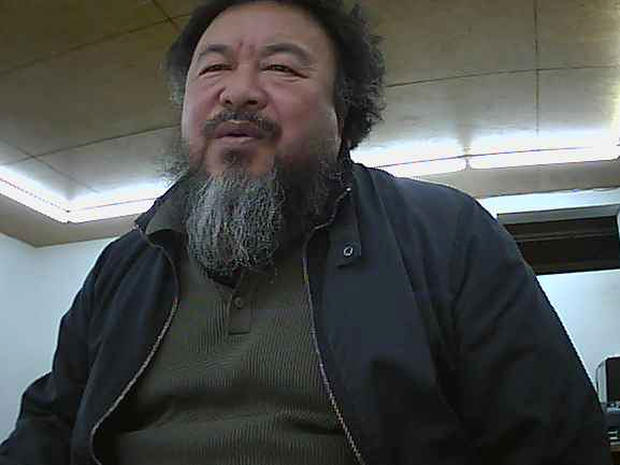 Ai Weiwei appears on a webcam in his home 