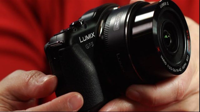 DSLR RB,Close-up of camera lens on table 