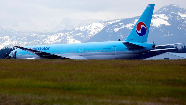 A Korean Airlines Boeing 777 sits on the runway of a Canadian Forces base in Comox, British Columbia, after an emergency landing April 10, 2012. 