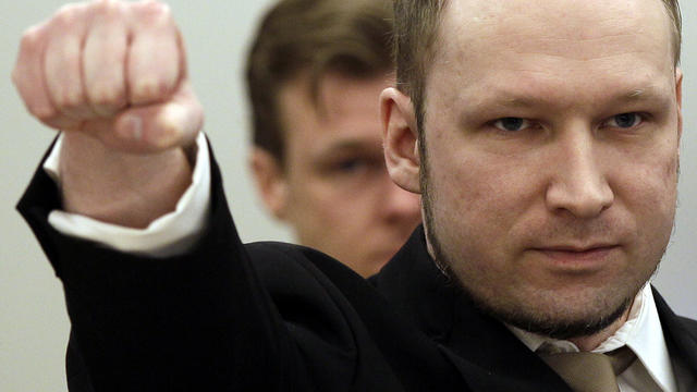 Accused Norwegian Anders Behring Breivik gestures as he arrives at the courtroom April 16, 2012, in Oslo, Norway. 
