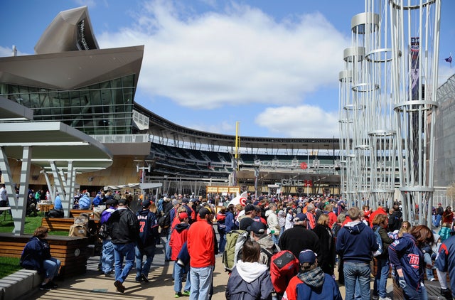 Fans wait on the plaza for the gates to open 