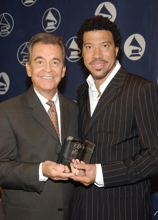 vince-bucci-producer-dick-clark-l-poses-with-governors-award-recipient-singer-lionel-richie.jpg 