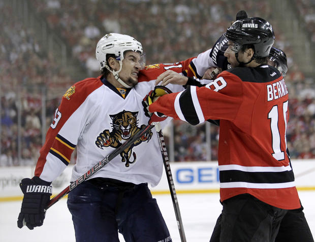 Scottie Upshall and Steve Bernier fight during the first period 