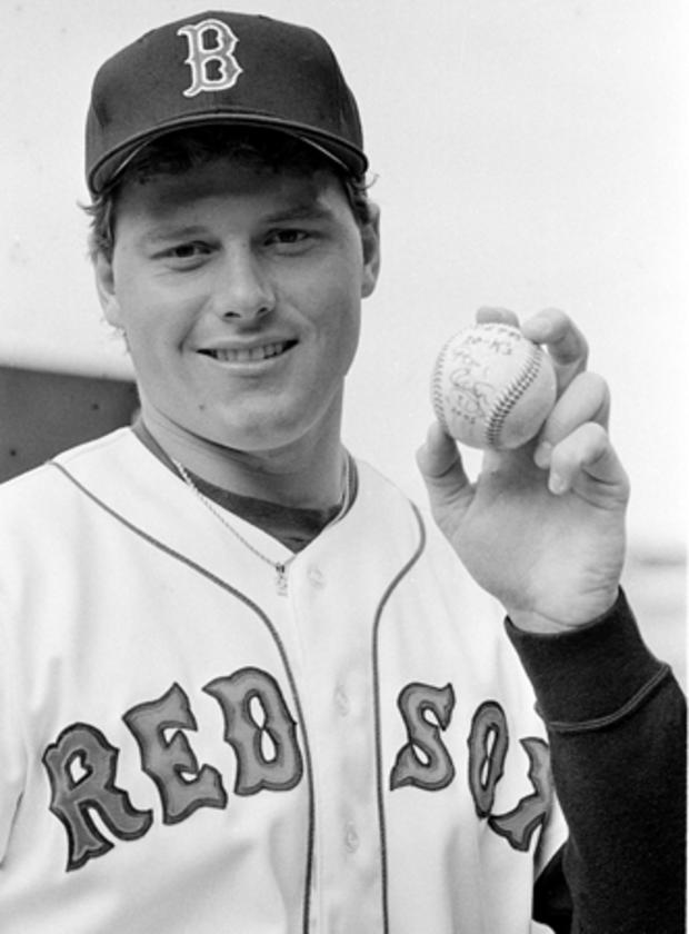 Roger Clemens poses with the game ball  