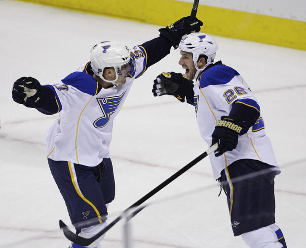 B.J. Crombeen is congratulated by left wing David Perron 