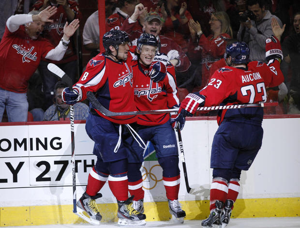 Alexander Semin celebrates his goal with left wing Alex Ovechkin 