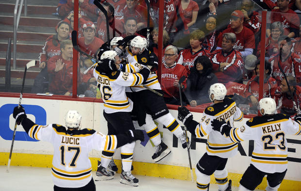 Members of the Boston Bruins celebrate  