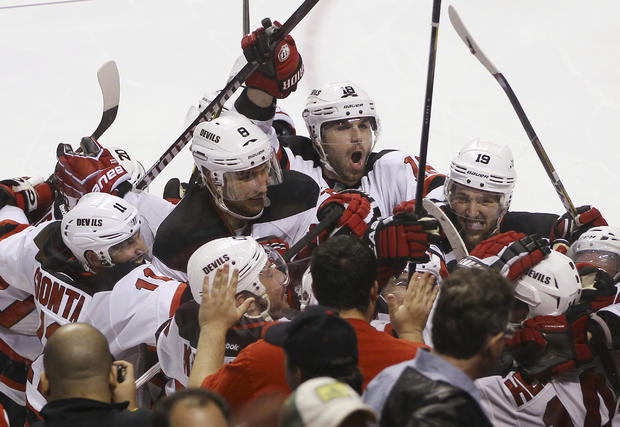 Devils celebrate after defeating the Panthers 
