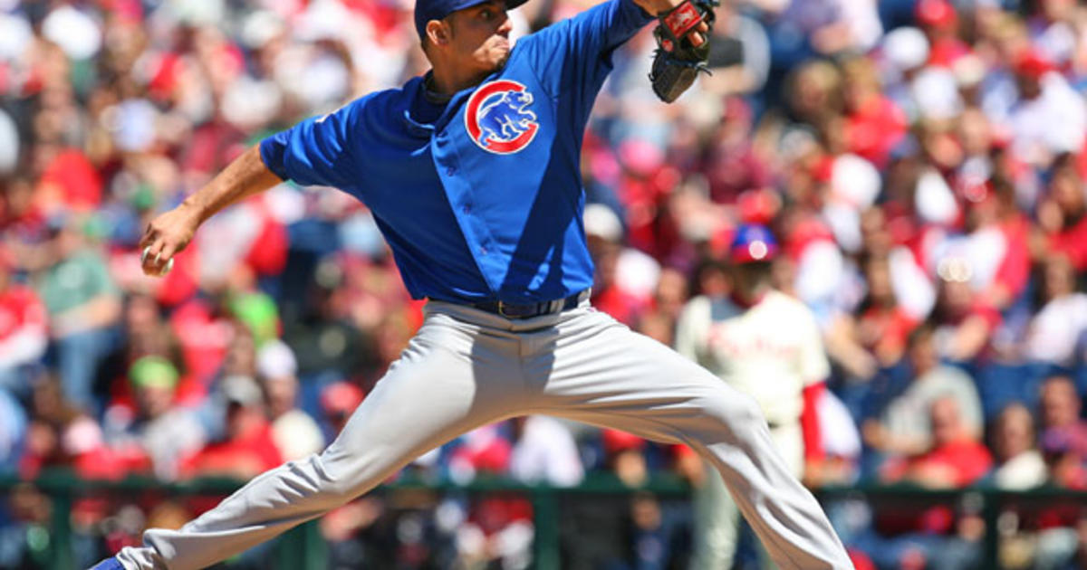 Chicago Cubs' Darwin Barney, right, throws to first after forcing