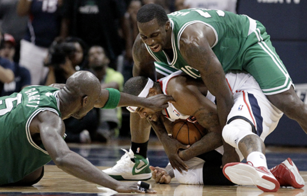 Josh Smith  is fouled by Brandon Bass  