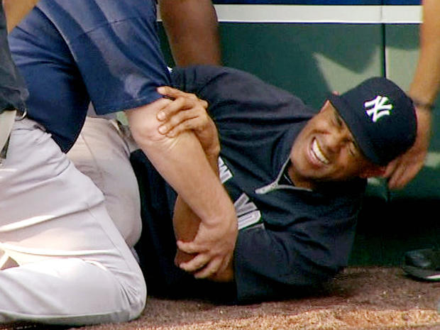 Mariano Rivera grimaces after twisting his right knee  