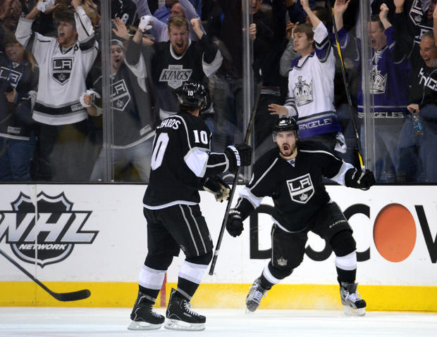 Drew Doughty celebrates his third period goal with teammate Mike Richards 