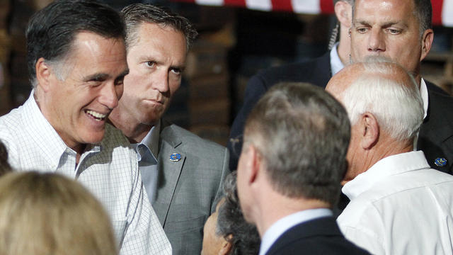 Mitt Romney greets people at Sauereisen construction materials company in Pittsburgh 