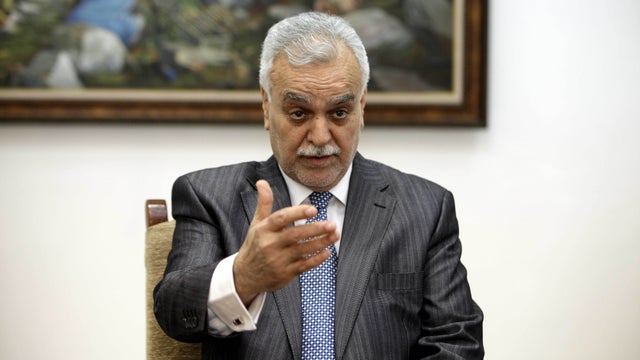 In this Dec. 23, 2011 file photo, Iraq's Sunni Vice President Tariq al-Hashemi speaks during an interview near Sulaimaniyah, northeast of Baghdad, Iraq. 