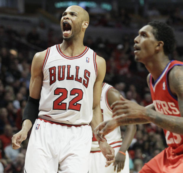 Taj Gibson reacts after making a free throw 