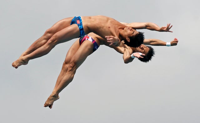 Team China performs during the men's 10-meter platform synchronized finals  