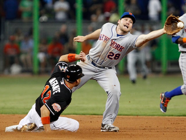Omar Infante steals second base  