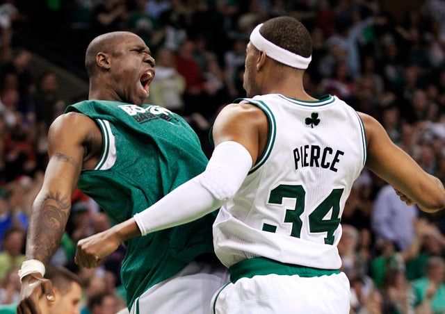 Paul Pierce chest-bumps Mickael Pietrus 