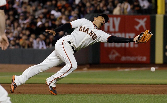 Emmanuel Burriss makes an error on a pop-up 