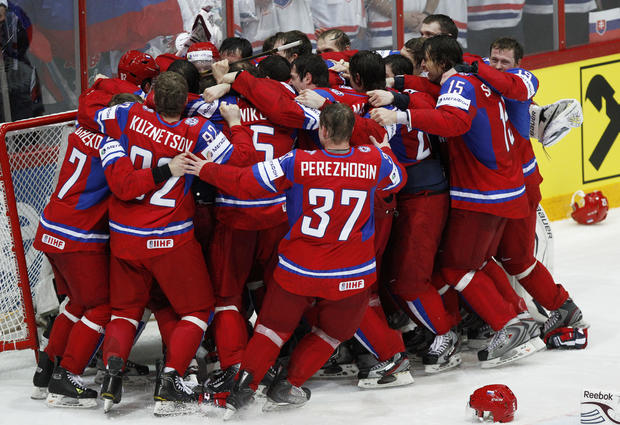 Russia team players celebrate their 6-2 victory 